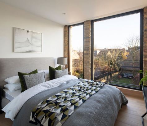 The Coach House by Selencky Parsons architects London Infill house upstairs bedroom