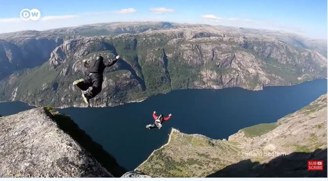 Extreme Sports Views: Base Jumping Off Kjerag Cliff In Lysefjord, Norway